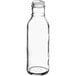 A clear glass Ring Neck dressing bottle with a lid.