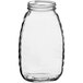 A clear glass jar with a black lid.