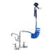 A white Waterloo wall-mounted pet grooming faucet with a blue coiled hose attached.