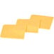 A group of Kraft yellow American cheese slices.