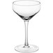 An Acopa Silhouette clear coupe glass with a stem on a white background.