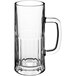 A clear glass Acopa tall beer mug with a handle.