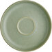 A sage green Acopa Pangea porcelain saucer with a round center.