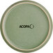 A close-up of an Acopa Pangea sage matte coupe porcelain plate.