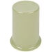 A sage green melamine cylinder for flatware.