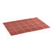 A red rubber mat with holes.