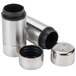 An American Metalcraft stainless steel round salt and pepper shaker set. A close-up of a silver container with black caps.