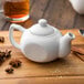 Acopa 10 oz. Bright White Porcelain Teapot with Lid Main Thumbnail 1