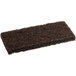 A brown sponge pad on a white background.