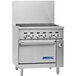 A stainless steel Imperial 6-burner broiler range with knobs.