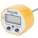 A Taylor digital pocket probe thermometer with yellow and black buttons.