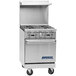 A large stainless steel Imperial Range commercial gas range with a griddle and oven.