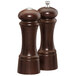 A close-up of two wooden Chef Specialties salt and pepper shakers.