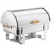 A silver stainless steel Choice Deluxe chafer with gold accents and a roll top lid.