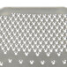 A stainless steel Tellier perforated sieve with small holes.