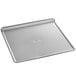 A close-up of a rimless Chicago Metallic aluminized steel cookie sheet.