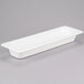 A white rectangular Camwear food pan with a lid.