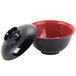 A black bowl with a red lid.
