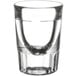 A Libbey fluted shot glass with a clear bottom and thin rim.