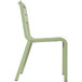 A Grosfillex sage green resin outdoor chair with white accents.