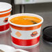 Choice 12 oz. Double Poly-Coated Paper Soup / Hot Food Cup with Vented Paper Lid - 250/Case Main Thumbnail 1