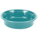 A close-up of a turquoise Fiesta extra large bowl with a ripple pattern.
