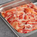 A pan of cooked lobster claw and knuckle meat.