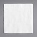A white EcoChoice bamboo beverage napkin with a textured pattern.