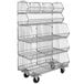 A Quantum chrome wire rack with three stacking baskets on wheels.