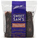 A bag of Sweet Sam's Individually Wrapped Double Chocolate Pound Cake on a table in a deli.