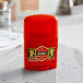 An Old Spice Swagger red and yellow deodorant stick.