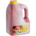 A white jug of Pace Medium Picante red liquid with a handle.