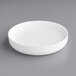 A white 89/400 continuous thread dome lid with foam liner on a gray surface.