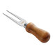 An Acopa stainless steel cheese fork with a dark wood handle.