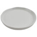 A cheforward melamine plate with a small rim on a white surface.