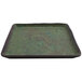 A green square cheforward by GET melamine plate with a speckled surface.