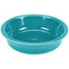A turquoise bowl from Fiesta Dinnerware on a white background.