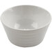 A white bowl with a curved edge.
