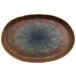 A round blue and brown Cheforward by GET melamine plate with a speckled design.