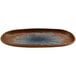A brown and blue cheforward melamine platter with a design on a table.