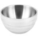 A silver Vollrath double wall metal bowl with a white background.