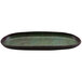 A green cheforward by GET spruce melamine platter with a brown oval center and black border.