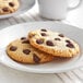 A plate of chocolate chip cookies with Ghirardelli Dark Chocolate chips.