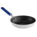 A close-up of a Vollrath aluminum fry pan with a blue Cool Handle.