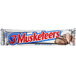 A close up of a 3 MUSKETEERS chocolate candy bar with red and blue packaging.