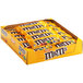 A case of M&M's Peanut Milk Chocolate candies in a box.