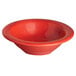 A close-up of a red Thunder Group melamine salad bowl.