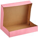 A Baker's Mark pink cardboard bakery box with a lid open.