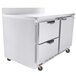 A stainless steel Beverage-Air worktop freezer with two drawers and a door on wheels.