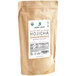 A bag of Jade Leaf Organic Hojicha Barista Edition roasted green tea powder with a label.